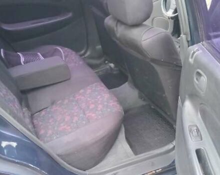 Синій Мазда 323, об'ємом двигуна 1.5 л та пробігом 70 тис. км за 1950 $, фото 8 на Automoto.ua