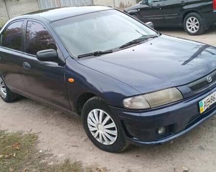 Синій Мазда 323, об'ємом двигуна 1.5 л та пробігом 70 тис. км за 1950 $, фото 5 на Automoto.ua