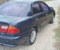 Синій Мазда 323, об'ємом двигуна 1.5 л та пробігом 70 тис. км за 1950 $, фото 3 на Automoto.ua