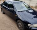 Синий Мазда 323, объемом двигателя 1.5 л и пробегом 285 тыс. км за 2500 $, фото 3 на Automoto.ua