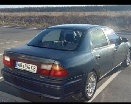 Синій Мазда 323, об'ємом двигуна 1.5 л та пробігом 272 тис. км за 1400 $, фото 2 на Automoto.ua