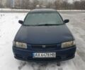 Синий Мазда 323, объемом двигателя 1.84 л и пробегом 299 тыс. км за 2000 $, фото 1 на Automoto.ua