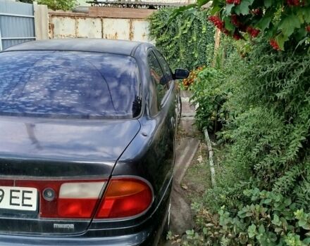 Синий Мазда 323, объемом двигателя 1.5 л и пробегом 400 тыс. км за 2574 $, фото 2 на Automoto.ua