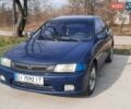 Синій Мазда 323, об'ємом двигуна 1.49 л та пробігом 785 тис. км за 2100 $, фото 1 на Automoto.ua