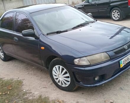 Синий Мазда 323, объемом двигателя 1.5 л и пробегом 74 тыс. км за 1950 $, фото 5 на Automoto.ua