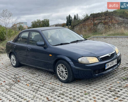 Синий Мазда 323, объемом двигателя 2 л и пробегом 310 тыс. км за 2500 $, фото 1 на Automoto.ua