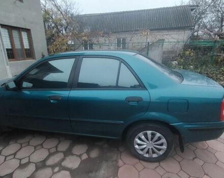 Синий Мазда 323, объемом двигателя 1.5 л и пробегом 280 тыс. км за 2700 $, фото 1 на Automoto.ua