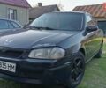 Синий Мазда 323, объемом двигателя 1.8 л и пробегом 320 тыс. км за 900 $, фото 1 на Automoto.ua