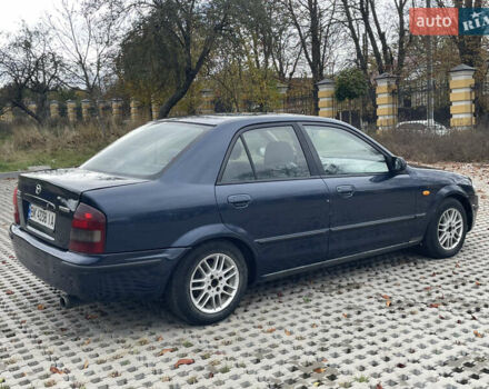 Синий Мазда 323, объемом двигателя 2 л и пробегом 310 тыс. км за 2500 $, фото 3 на Automoto.ua