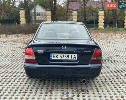 Синий Мазда 323, объемом двигателя 2 л и пробегом 310 тыс. км за 2500 $, фото 4 на Automoto.ua