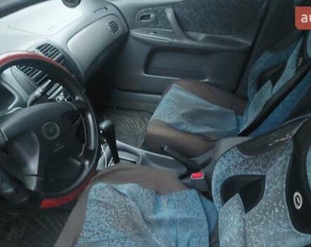 Синий Мазда 323, объемом двигателя 1.5 л и пробегом 280 тыс. км за 2700 $, фото 5 на Automoto.ua