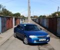 Синий Мазда 323, объемом двигателя 1.5 л и пробегом 238 тыс. км за 2500 $, фото 1 на Automoto.ua