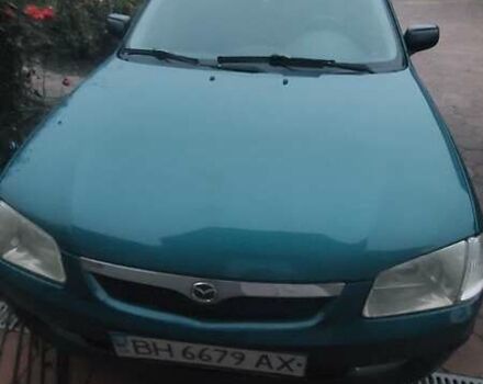 Синий Мазда 323, объемом двигателя 1.5 л и пробегом 280 тыс. км за 2700 $, фото 3 на Automoto.ua
