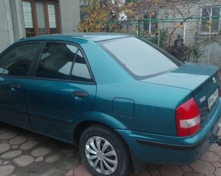 Синий Мазда 323, объемом двигателя 1.5 л и пробегом 280 тыс. км за 2700 $, фото 3 на Automoto.ua