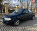 Синий Мазда 323, объемом двигателя 2 л и пробегом 310 тыс. км за 2000 $, фото 1 на Automoto.ua