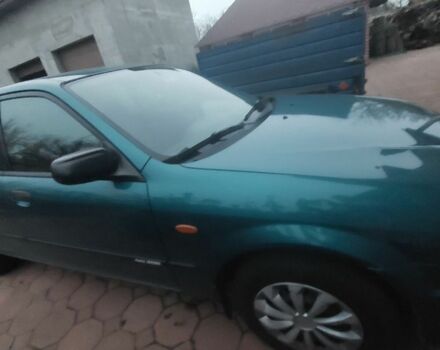 Синий Мазда 323, объемом двигателя 1.5 л и пробегом 280 тыс. км за 2700 $, фото 5 на Automoto.ua