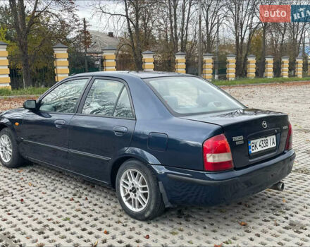 Синий Мазда 323, объемом двигателя 2 л и пробегом 310 тыс. км за 2000 $, фото 3 на Automoto.ua