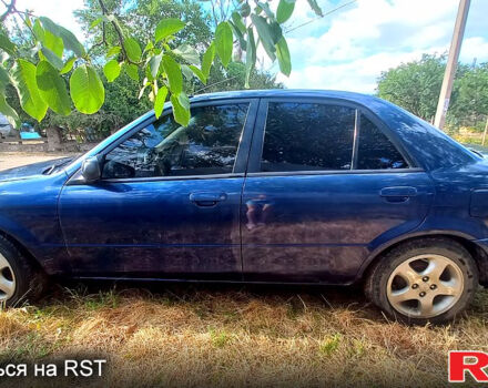 Синій Мазда 323, об'ємом двигуна 1.6 л та пробігом 0 тис. км за 2999 $, фото 3 на Automoto.ua