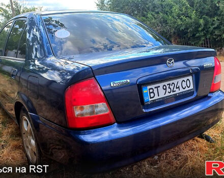 Синій Мазда 323, об'ємом двигуна 1.6 л та пробігом 0 тис. км за 2999 $, фото 6 на Automoto.ua