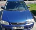 Синий Мазда 323, объемом двигателя 1.5 л и пробегом 410 тыс. км за 2500 $, фото 1 на Automoto.ua