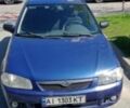 Синий Мазда 323, объемом двигателя 1.5 л и пробегом 410 тыс. км за 2500 $, фото 1 на Automoto.ua