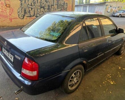 Синий Мазда 323, объемом двигателя 1.6 л и пробегом 400 тыс. км за 2200 $, фото 4 на Automoto.ua