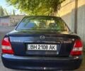 Синий Мазда 323, объемом двигателя 1.6 л и пробегом 400 тыс. км за 2200 $, фото 2 на Automoto.ua
