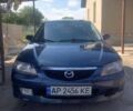 Синий Мазда 323, объемом двигателя 1.6 л и пробегом 300 тыс. км за 1800 $, фото 1 на Automoto.ua