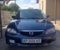 Синий Мазда 323, объемом двигателя 1.6 л и пробегом 300 тыс. км за 1800 $, фото 1 на Automoto.ua