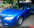 Синій Мазда 323, об'ємом двигуна 1.6 л та пробігом 240 тис. км за 2400 $, фото 1 на Automoto.ua