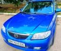 Синій Мазда 323, об'ємом двигуна 1.6 л та пробігом 240 тис. км за 2400 $, фото 1 на Automoto.ua