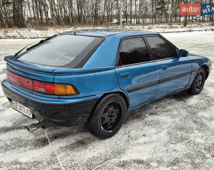 Синий Мазда 323, объемом двигателя 1.6 л и пробегом 195 тыс. км за 999 $, фото 4 на Automoto.ua