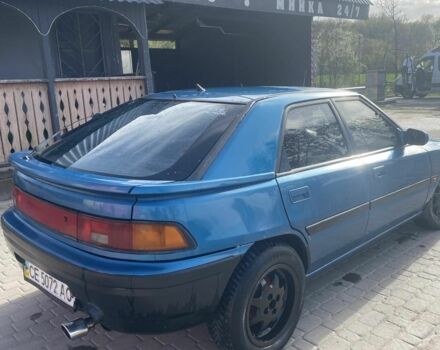 Синий Мазда 323, объемом двигателя 1 л и пробегом 357 тыс. км за 1500 $, фото 4 на Automoto.ua