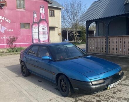 Синий Мазда 323, объемом двигателя 1 л и пробегом 357 тыс. км за 1500 $, фото 3 на Automoto.ua