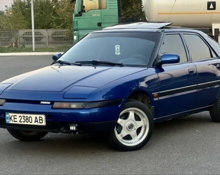 Синий Мазда 323, объемом двигателя 1.6 л и пробегом 250 тыс. км за 3299 $, фото 1 на Automoto.ua