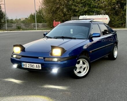 Синий Мазда 323, объемом двигателя 1.6 л и пробегом 250 тыс. км за 3299 $, фото 3 на Automoto.ua