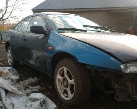 Синий Мазда 323, объемом двигателя 1.8 л и пробегом 345 тыс. км за 700 $, фото 4 на Automoto.ua