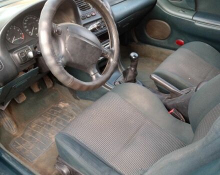 Синий Мазда 323, объемом двигателя 1.8 л и пробегом 345 тыс. км за 700 $, фото 2 на Automoto.ua