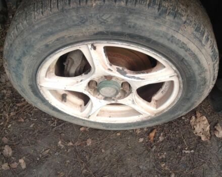 Синий Мазда 323, объемом двигателя 1.8 л и пробегом 345 тыс. км за 700 $, фото 5 на Automoto.ua