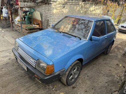 Синий Мазда 323, объемом двигателя 1.5 л и пробегом 253 тыс. км за 300 $, фото 1 на Automoto.ua