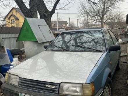 Синій Мазда 323, об'ємом двигуна 1.5 л та пробігом 293 тис. км за 400 $, фото 1 на Automoto.ua