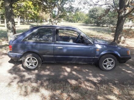Синий Мазда 323, объемом двигателя 0 л и пробегом 200 тыс. км за 33000 $, фото 1 на Automoto.ua