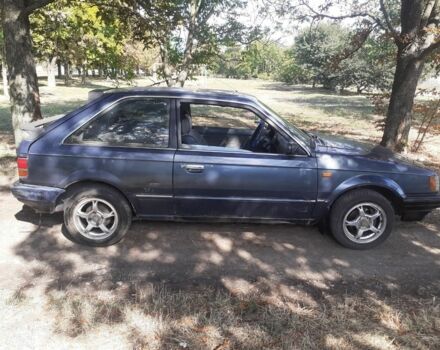 Синій Мазда 323, об'ємом двигуна 0 л та пробігом 200 тис. км за 848 $, фото 1 на Automoto.ua
