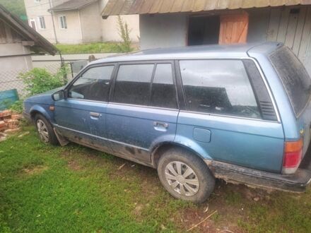 Синий Мазда 323, объемом двигателя 1 л и пробегом 3 тыс. км за 850 $, фото 1 на Automoto.ua