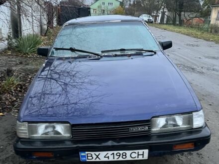 Синій Мазда 323, об'ємом двигуна 1.8 л та пробігом 200 тис. км за 350 $, фото 1 на Automoto.ua