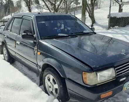 Синий Мазда 323, объемом двигателя 1.3 л и пробегом 333 тыс. км за 1100 $, фото 1 на Automoto.ua