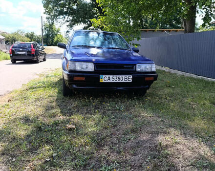 Синий Мазда 323, объемом двигателя 1.6 л и пробегом 500 тыс. км за 650 $, фото 1 на Automoto.ua