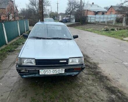 Синий Мазда 323, объемом двигателя 1.6 л и пробегом 320 тыс. км за 400 $, фото 1 на Automoto.ua