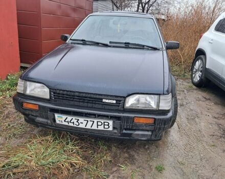 Синій Мазда 323, об'ємом двигуна 1.5 л та пробігом 200 тис. км за 1400 $, фото 1 на Automoto.ua