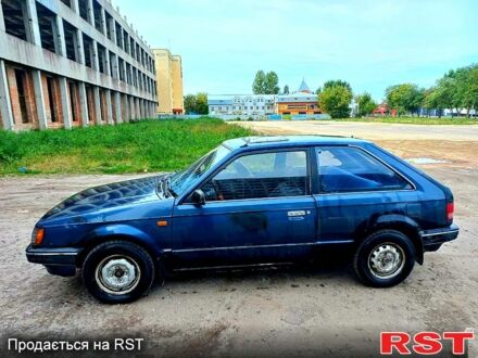 Синій Мазда 323, об'ємом двигуна 1.5 л та пробігом 254 тис. км за 530 $, фото 1 на Automoto.ua